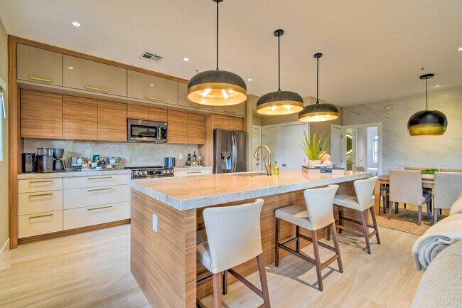 The chef's kitchen at LUXE del SOL is a foodie's paradise. - 11500 E Cochise Dr