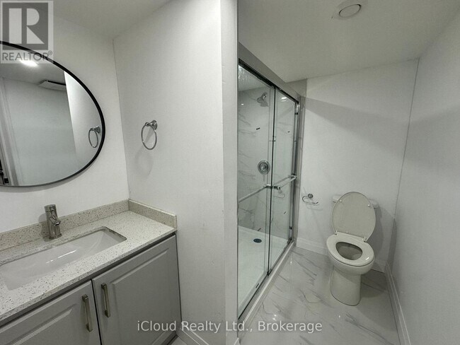 Photo du bâtiment - 65 Periwinkle Way