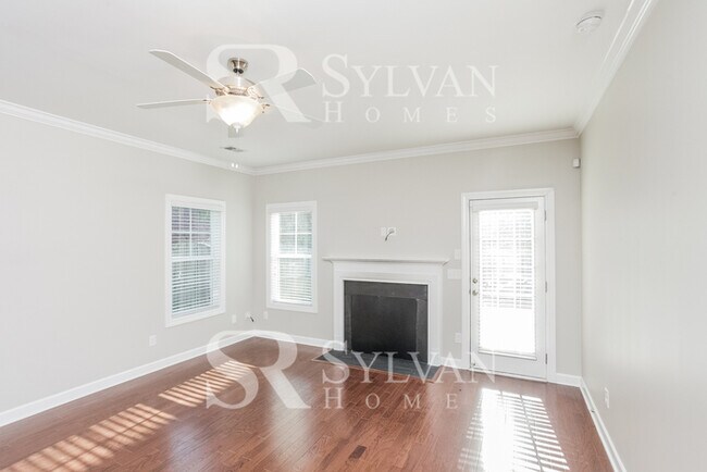 Building Photo - The living is easy in this lovely 5 bedroo...