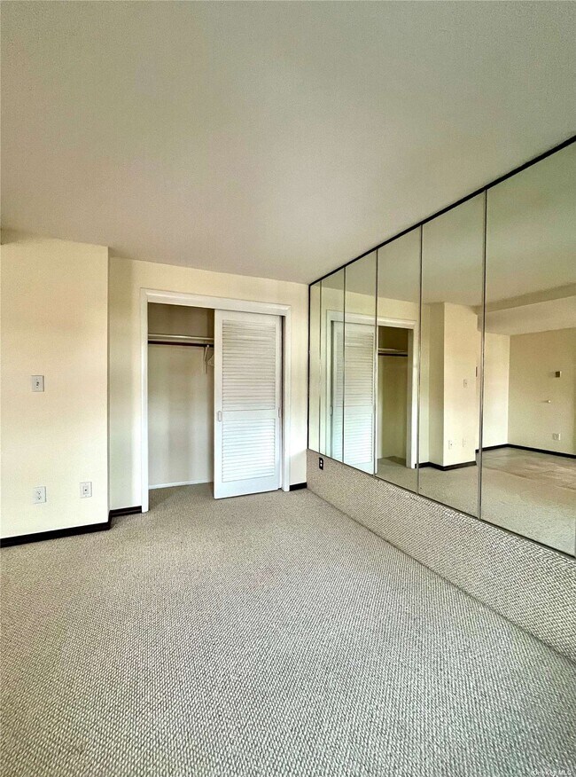 Building Photo - 5000 Hempstead Tpke