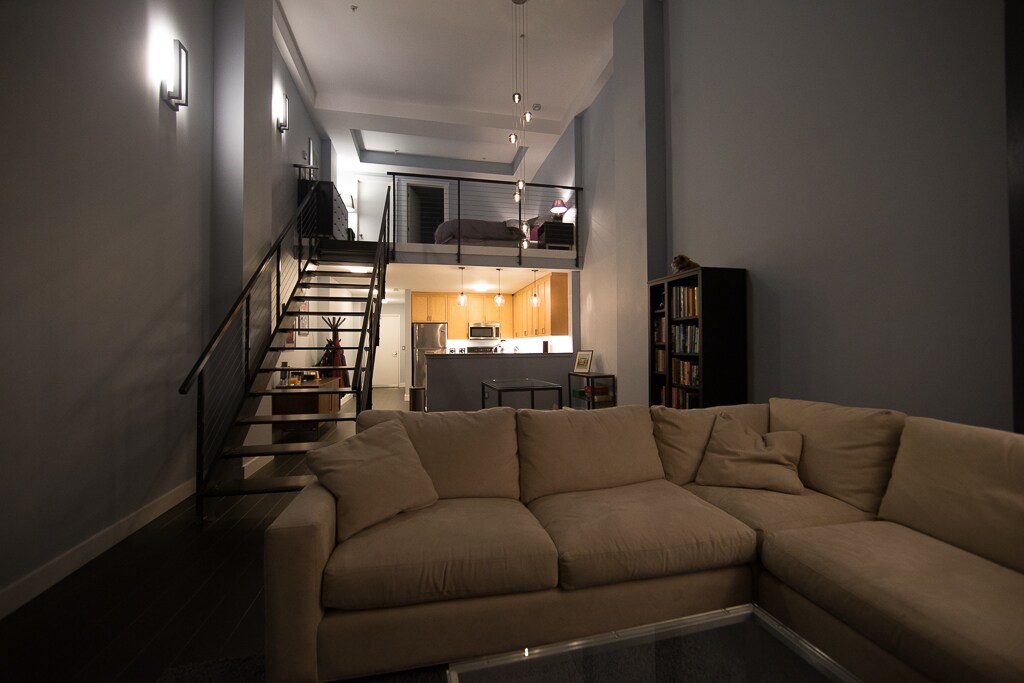 Living room and view of bedroom upstairs - 330 13th St