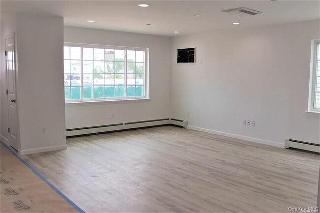 Building Photo - 69-03 Bayfield Ave