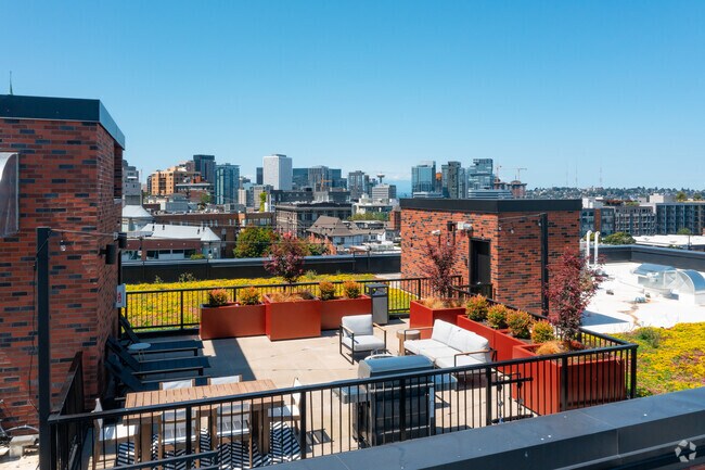 ¡Terraza en la azotea - Woodworth Apartments | Vibrant & Luxurious Living in Capitol Hill
