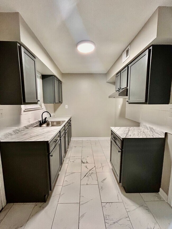 Building Photo - HALF OFF FIRST MONTHS RENT PROMOTION