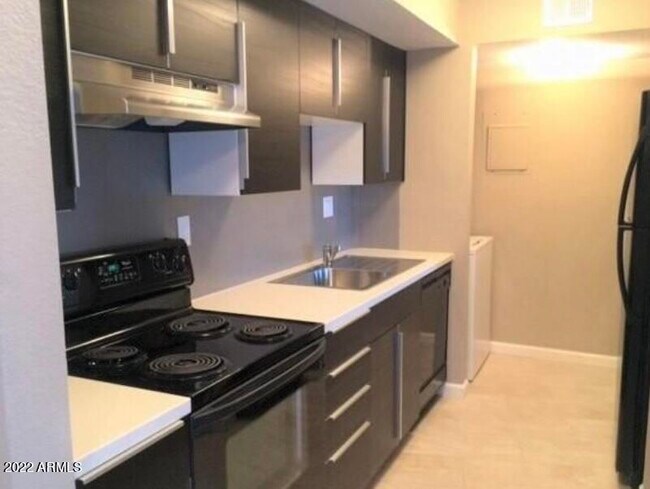 Foto del edificio - 6118 W Morten Ave