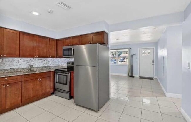 Foto del edificio - 4998 SW 92nd Terrace