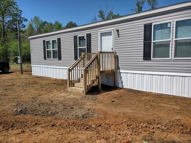 Building Photo - 6875 Catchall Rd