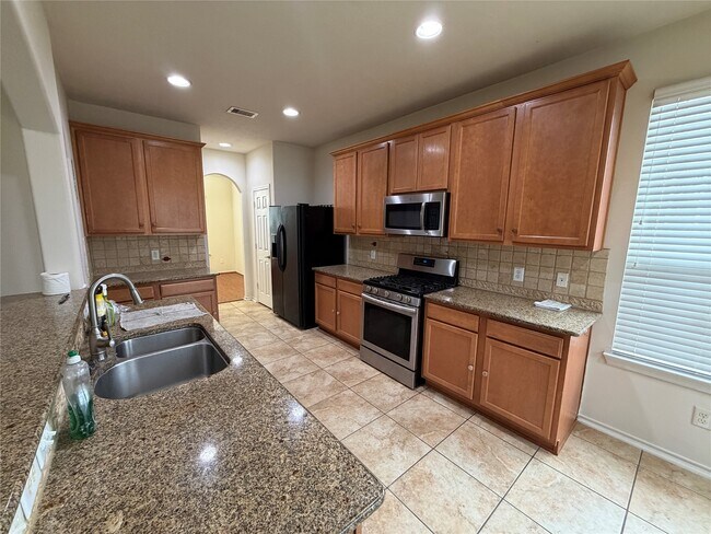 Foto del edificio - 6826 Pheasant Oak Dr