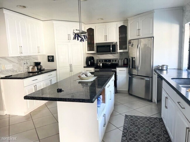 Foto del edificio - 4 br, 2 bath House - 7363 NW 49th Ct # 7363