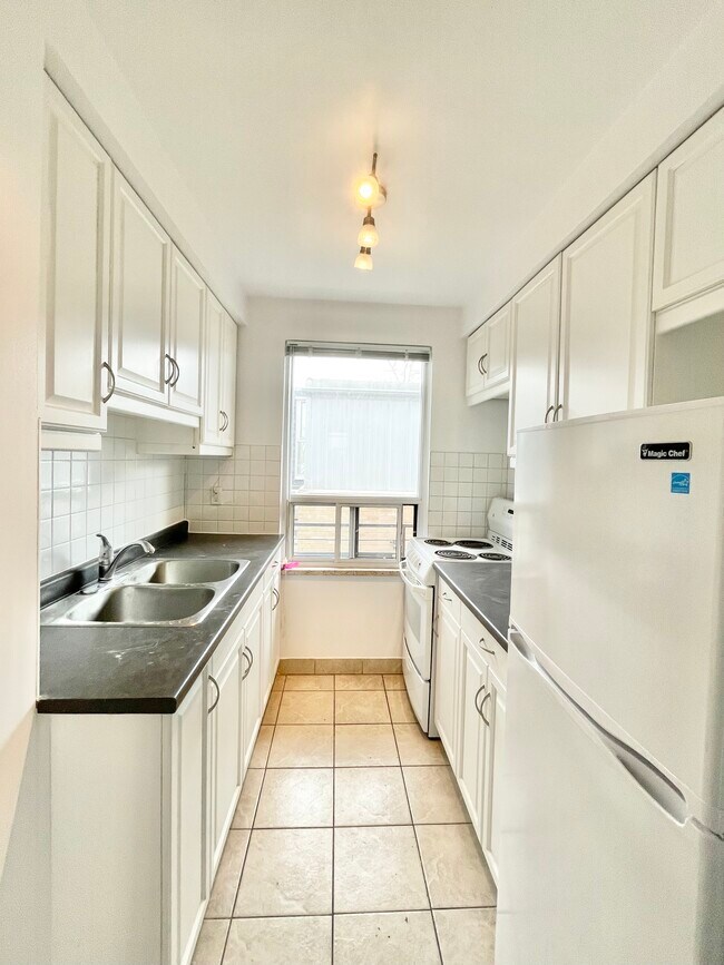 Photo du bâtiment - 67 Lake Shore Dr