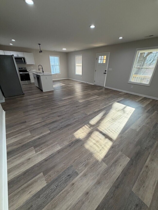 Building Photo - Open concept, location and easy living!