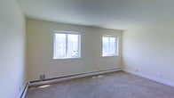 Located at 124 N North Carolina Ave in Atlantic City, New Jersey, this single-floor residence offers a straightforward and functional layout designed for comfortable everyday living. The interior is finished with wall-to-wall carpeting that adds warmth underfoot, complemented by smooth, light-toned walls that create a clean and neutral backdrop throughout the space. Natural light is a key feature, with multiple windows positioned to draw in ample daylight and provide views of the surrounding neighborhood. The windows are fitted with blinds, offering flexible light control and privacy. Baseboard heating runs along the perimeter of the rooms, providing an efficient and unobtrusive climate control solution. The overall ambiance of the space is calm and understated, with a simple, move-in-ready aesthetic that allows for easy personalization. Situated in Atlantic City, the unit benefits from a well-connected location with proximity to local amenities, transportation, and the broader coastal community that defines this iconic New Jersey destination.