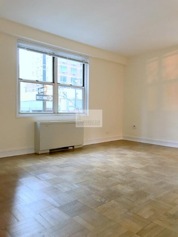 Building Photo - 888 8th Ave