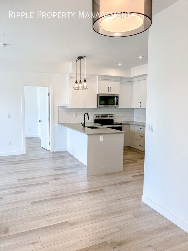 Photo du bâtiment - INCREDIBLE 2 BEDS/ 2 BATHS CONDO | SPRINGBANK HILL LIVING