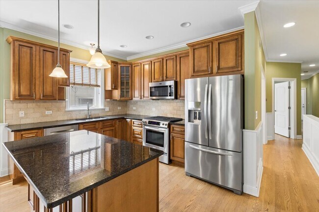 Foto del edificio - 7246 N Oakley Ave