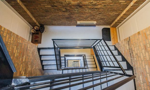 Front stairwell of this well-maintained, secure building. - 5210 N WINTHROP AVE, APT 4