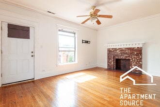 Building Photo - 902 W Belle Plaine Ave