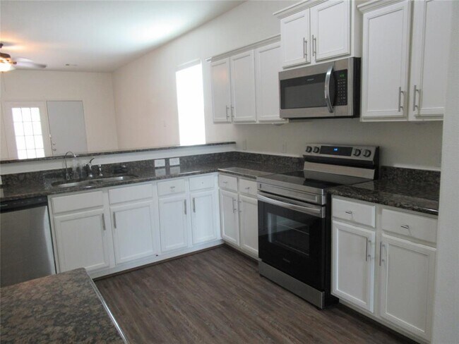 Building Photo - 1306 Wallflower Ave