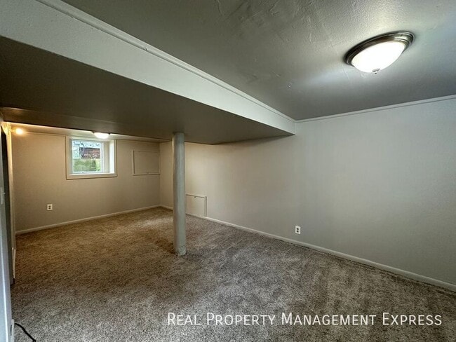 Building Photo - Lower Level Studio Apartment