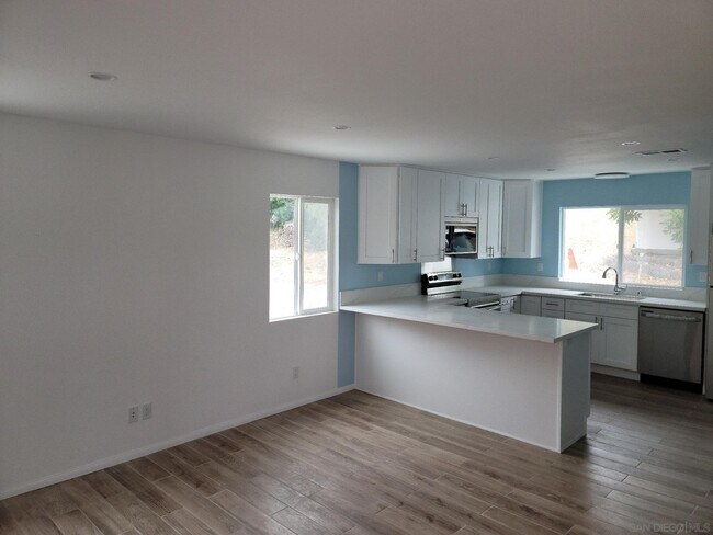 Building Photo - 9612 Petite Ln