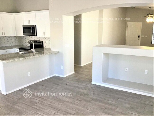 Building Photo - 10476 W Sunflower Pl