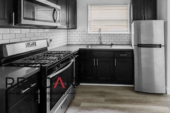Building Photo - One of a Kind, Completely Remodeled One Be...
