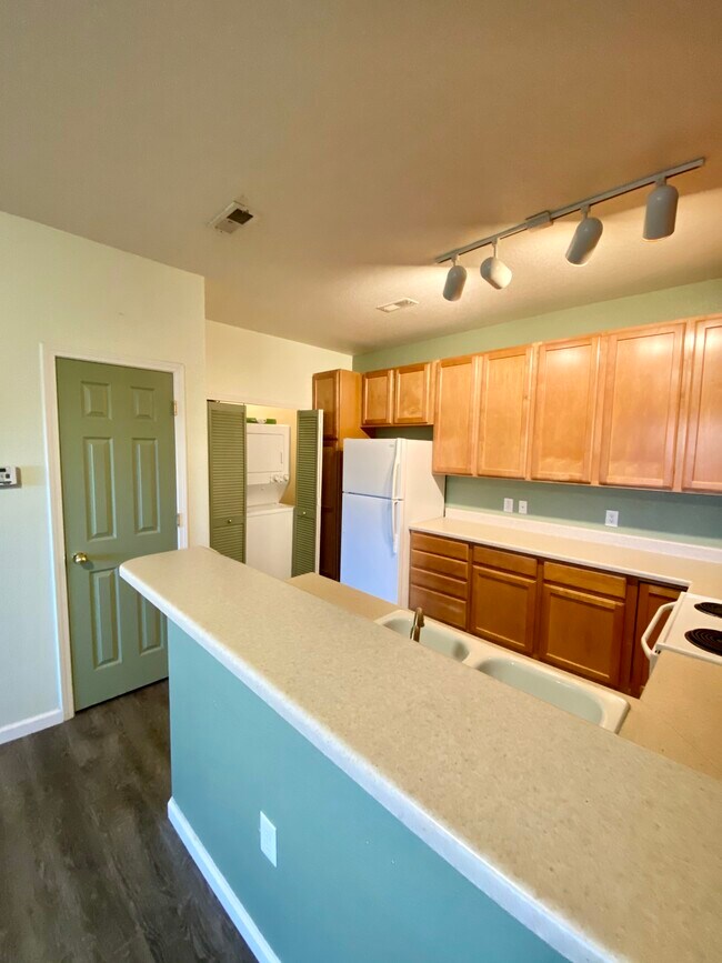 Kitchen w laundry and closet - 16312 E Fremont Ave