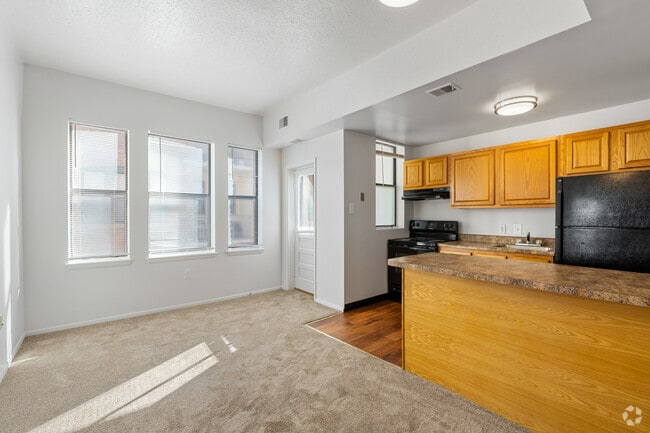 2BR, 1BA - 872SF - Living Room, Dining Room - R Street Apartments