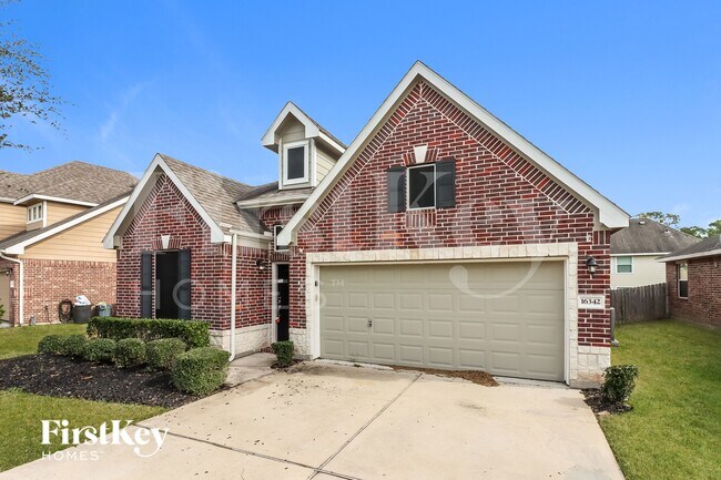 Foto del edificio - 16342 River Wood Ct