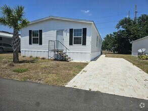 Building Photo - 6631 Hidden Oaks Dr