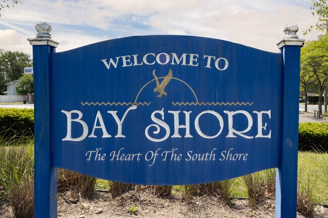 Signage on the northern end of Bay Shore, NY welcomes residents and visitors to town.