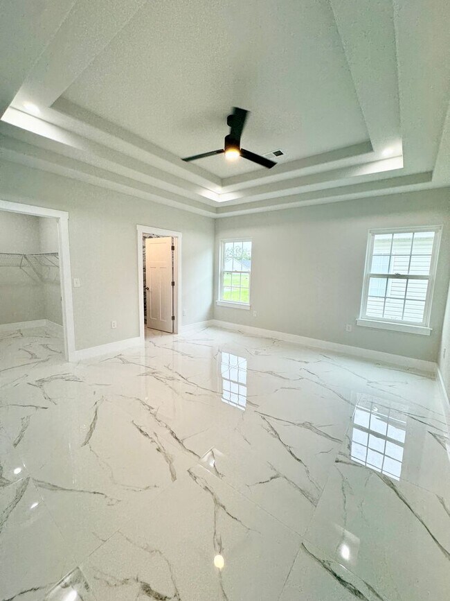 Foto del edificio - LOOK AT THIS ONE! BEAUTIFUL home with a pond view right outside the back patio!