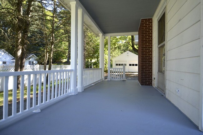 Brand new wrap around porch! - 1680 Main St