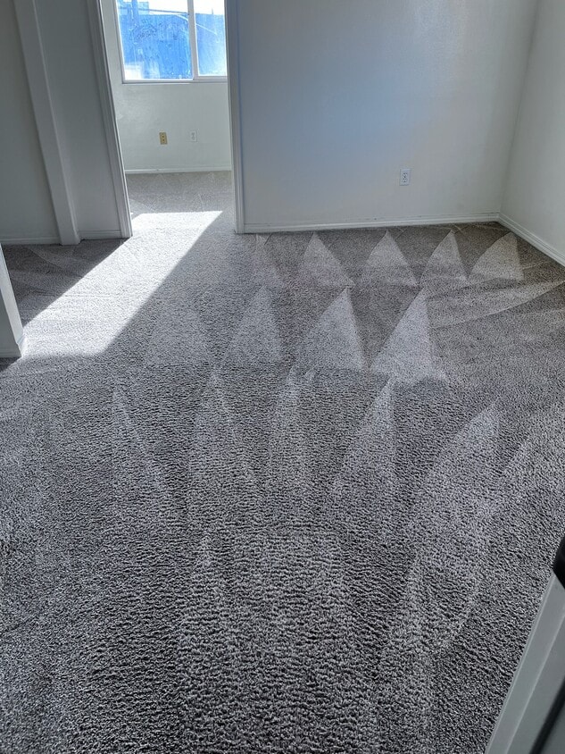The unit actually has tile floor throughout exactly like the other pictures - 2237 Whittier Blvd