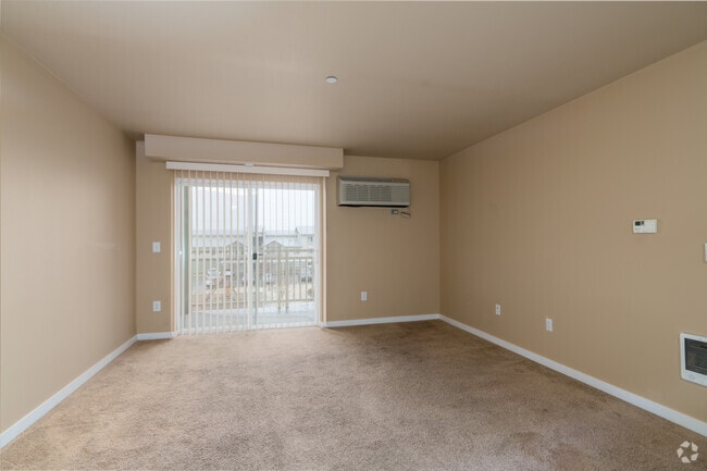 3BR, 2BA - 1265SF - Living Room - Basalt Ridge Apartments