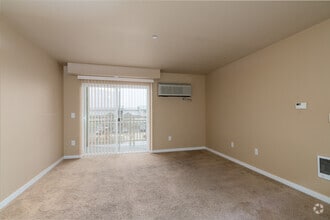 3BR, 2BA - 1265SF - Living Room - Basalt Ridge Apartments