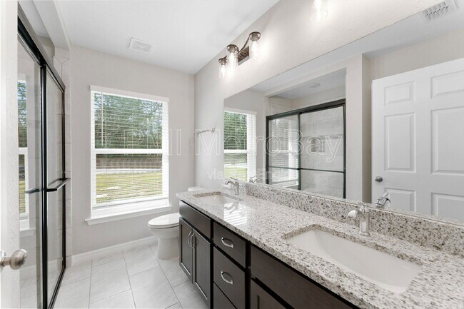 Foto del edificio - 9461 N Sandree Dr