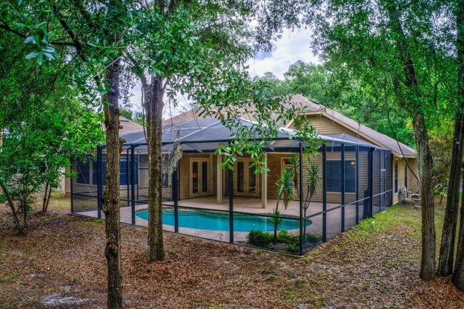 Building Photo - Stunning 4BR/2.5BA Pool Home located in El...