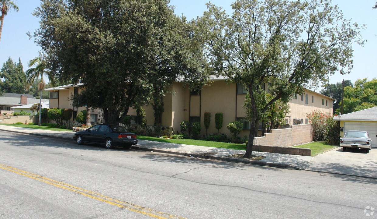 Building Photo - Whispering Palms Apartments