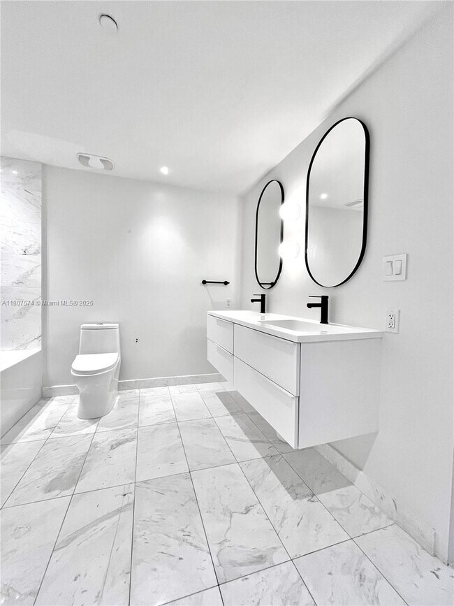Foto del edificio - 9940 W Bay Harbor Dr