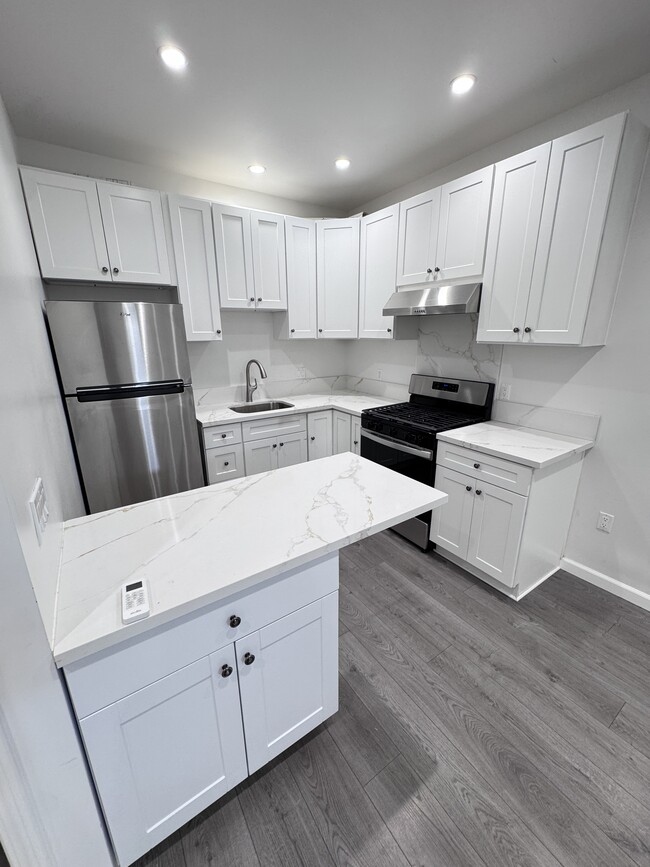 Kitchen with barstool - 13180 Branford St