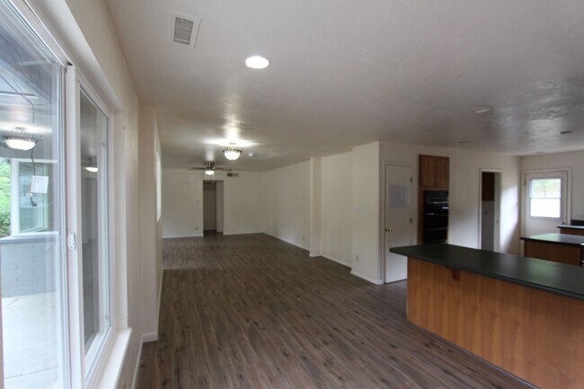 Building Photo - COMING AUGUST | 3-Bedroom Home in Bow & Arrow Acres | Large Yard + Wood-Burning Fireplace