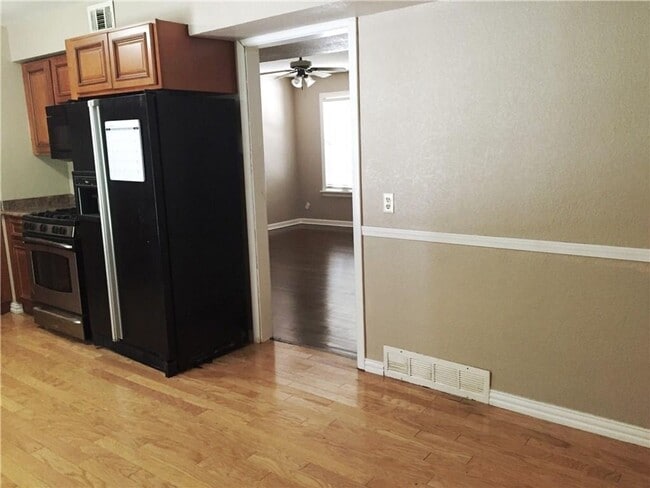 Building Photo - Remodeled 1 story home in Hurst with original plank wood flooring