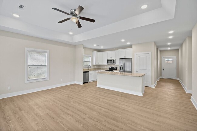 Building Photo - READY NOW! NEWLY CONSTRUCTED DUPLEX!