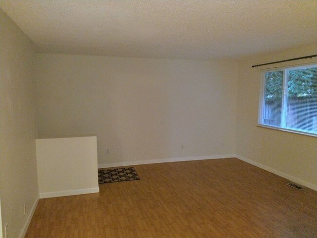 Building Photo - Charming updated 3 bed 1 bath ranch style home with double car garage and large fenced back yard.