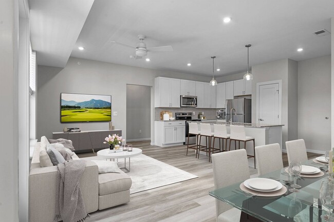 Kitchen Island, Dining, and Living Room - The Preserve at Peters Township