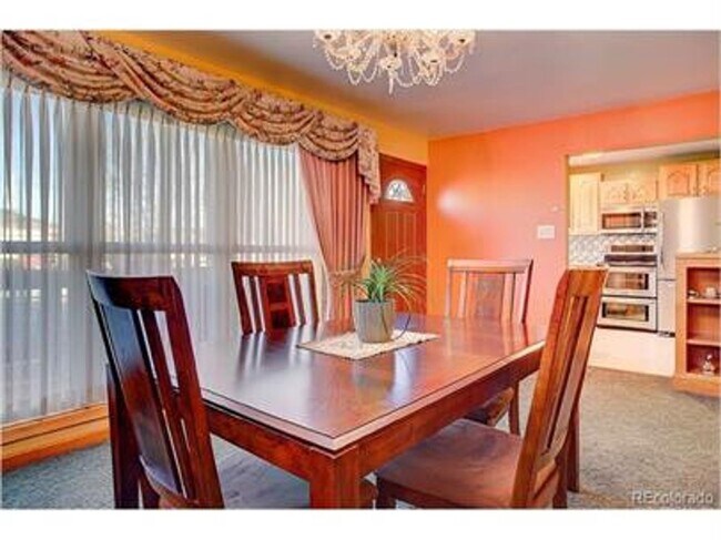 Building Photo - Updated clean and colorful 4 bed 2 bath ranch with a 2-Car garage!