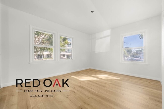 Building Photo - ~1 Month FREE~ Redone, Incredible Three Be...