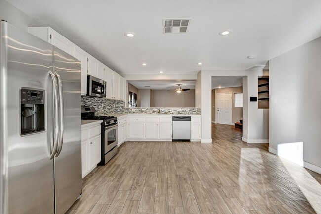 Building Photo - Totally Updated Solar Powered 4 Bedroom! Bedroom and Bath Downstairs!