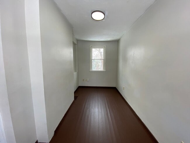 Building Photo - Cozy Akron Home w/ Fireplace Charm, Detached Garage & Back Porch